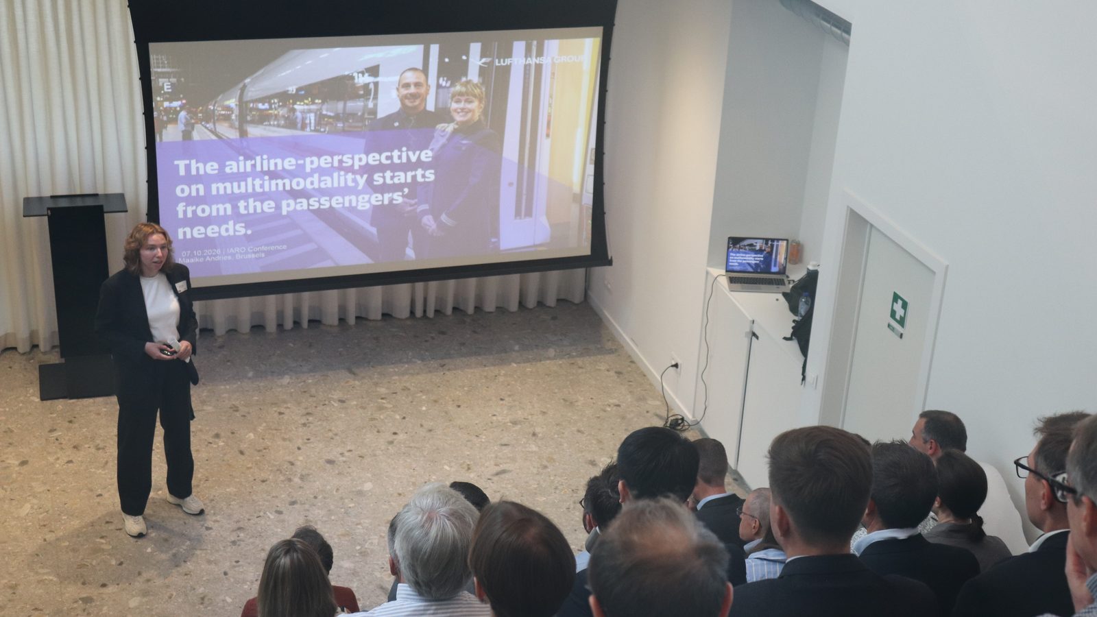Maaike Andries of Brussels Airlines presenting at AHLEX, with the slide 'The airline-perspective on multimodality starts from the passengers' needs'